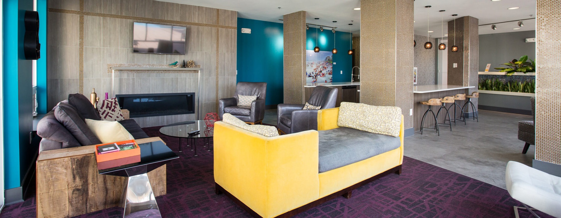 Resident clubhouse with yellow couch
