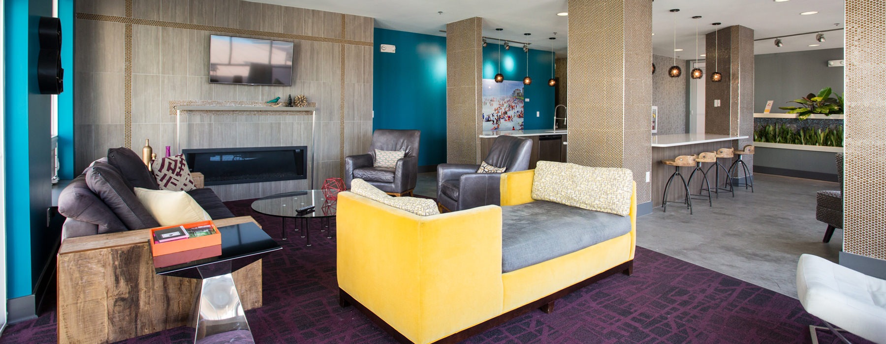 Resident clubhouse with yellow couch